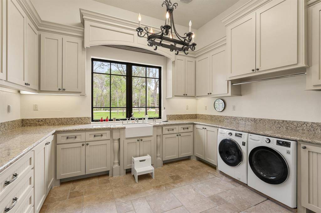 Often a forgotten area in many homes, this laundry room is sure wow and offers everything you could want to make laundry a cinch