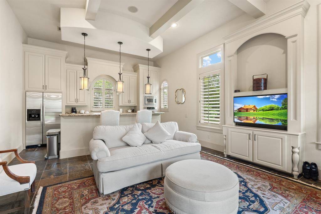 The guest quarters feature a private mini kitchen and living area, providing a comfortable and convenient retreat for visitors.