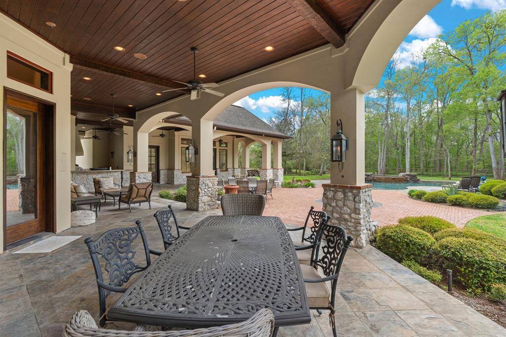 The patio is a welcoming outdoor space, ideal for al fresco dining, entertaining guests, or simply unwinding in the fresh air.