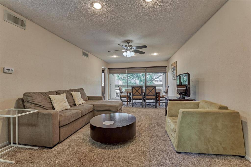 This room offers enough space for a living and dining area.