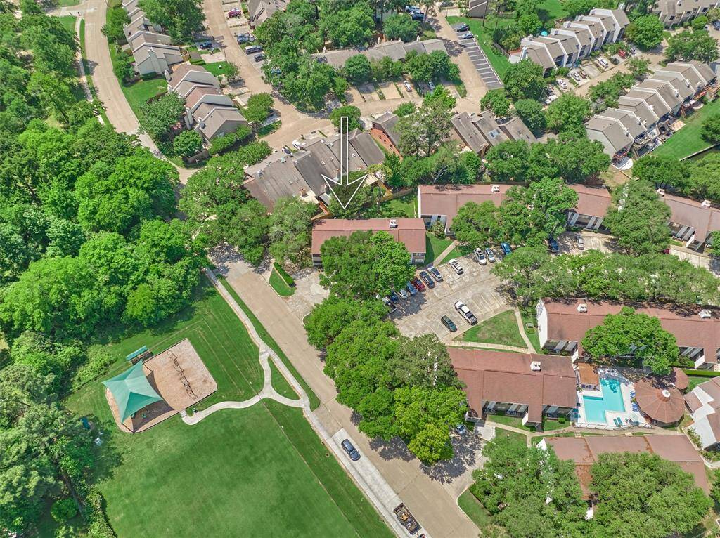 This condo is nestled among mature trees providing a nice, shaded balcony and right across the street from the community playground.