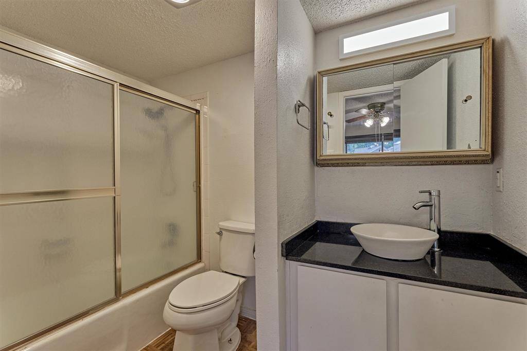 This bathroom services the primary bedroom.