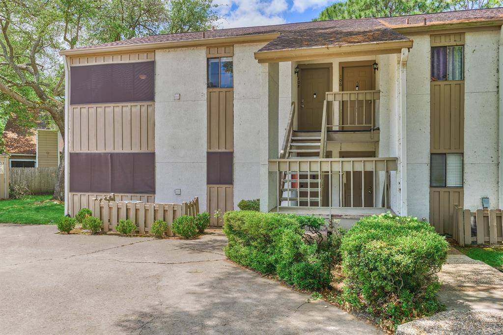Condo is upstairs on the left hand side.