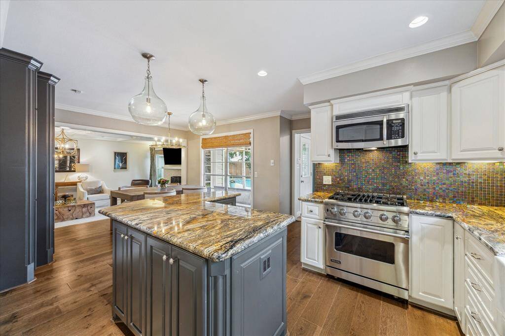 Lovely updated kitchen with island, Viking range and stainless appliances