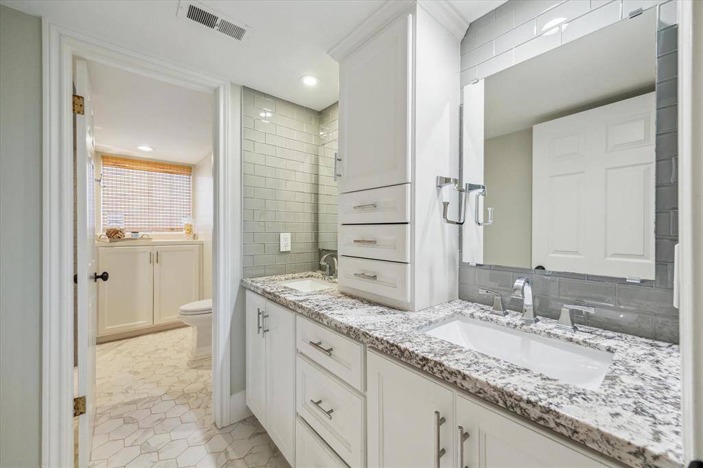 Upstairs updated secondary bath with dual sinks