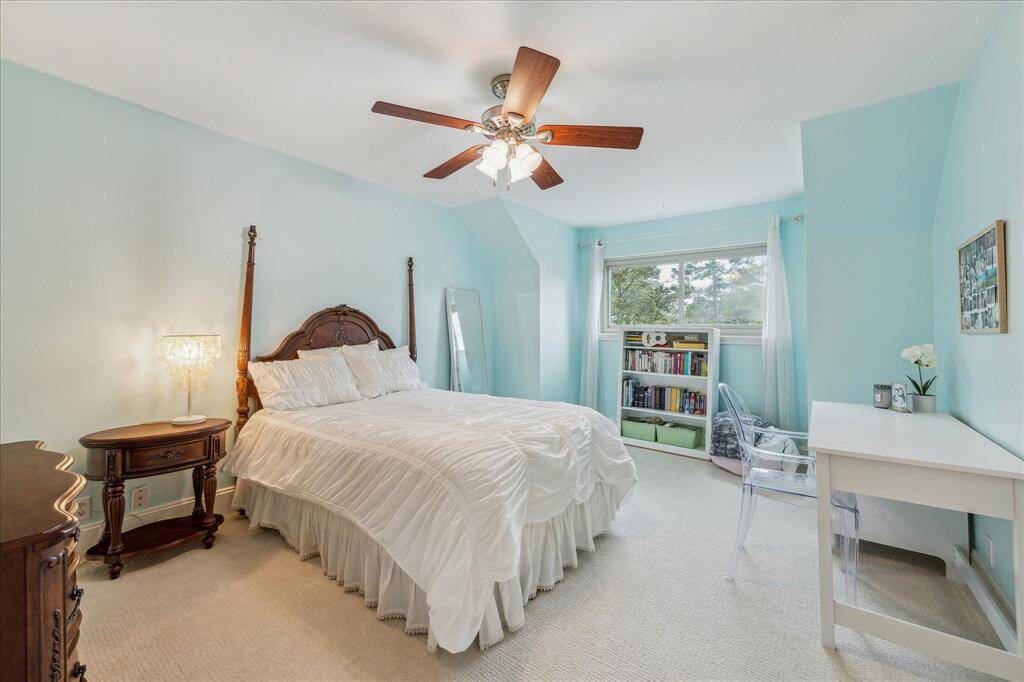 Another secondary upstairs bedroom with 2025 carpet