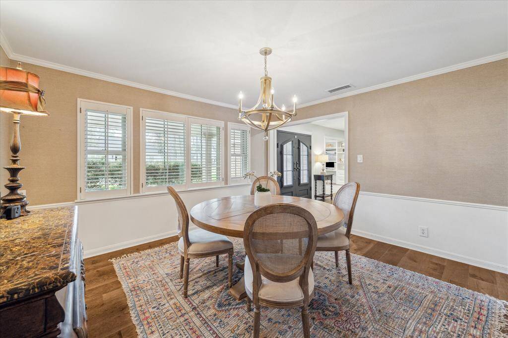 Formal dining room off of the kitchen with hardwoods