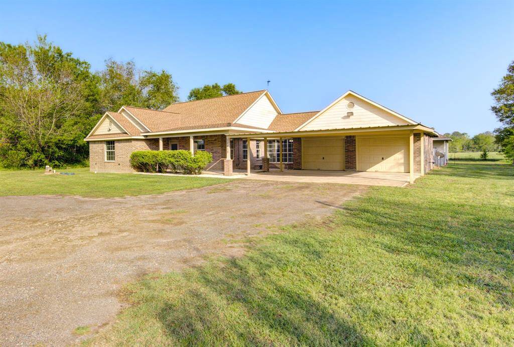 Garage connects to Sunroom; has windows & back door