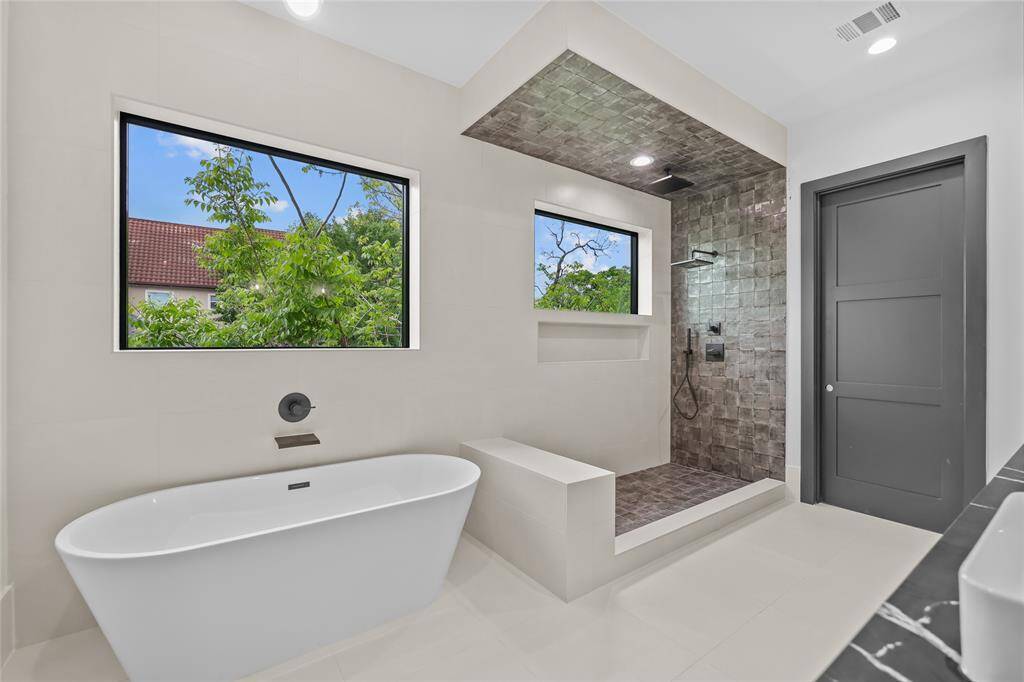 Primary Bathroom, separate shower and soaking tub. Current stage of construction 4/24* Estimated completion 5/1.