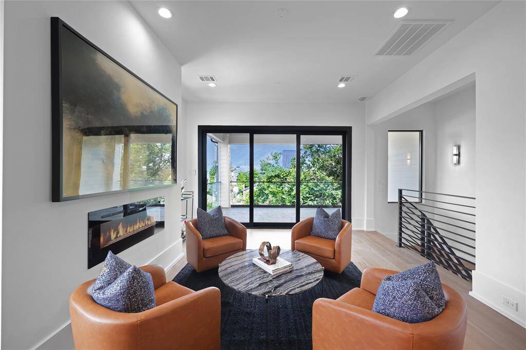 Game room, bar with beverage cooler, sink and space for an ice maker. *Photo shown is of the model home. Finishes and selections may vary.