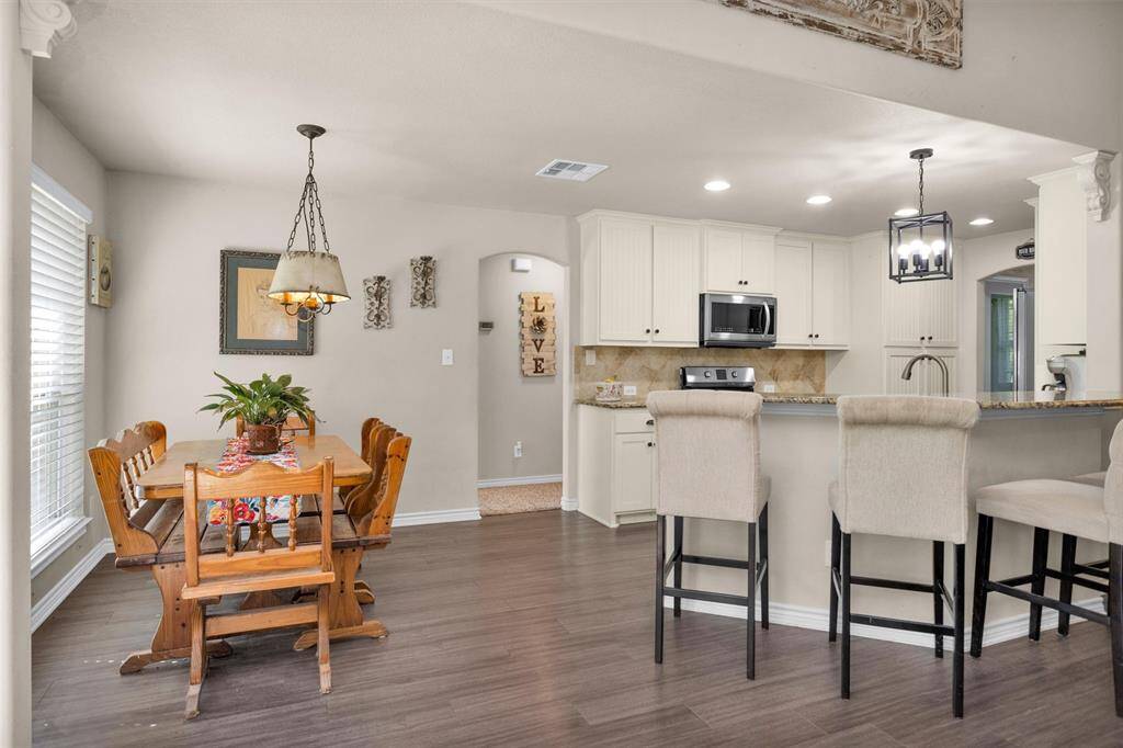 Breakfast area.  The hall way takes you to the 2 guest rooms and guest full bath.