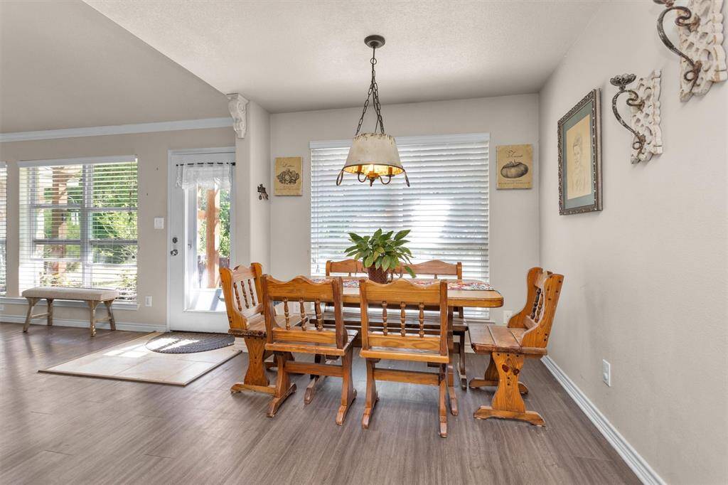 Breakfast area is situated on back side of home.