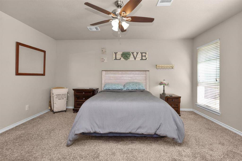 Primary room is spacious and situated on back side of home.