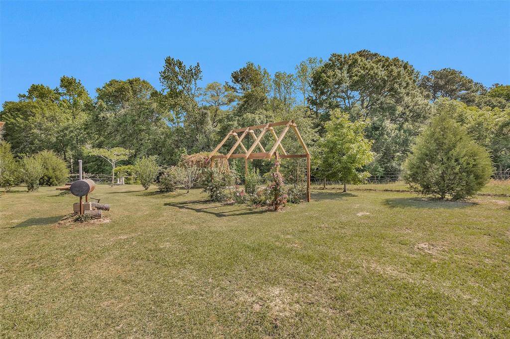 Another view of back yard.  If you look close you will see the back fence line.  No neighbors in the back or left side of home.