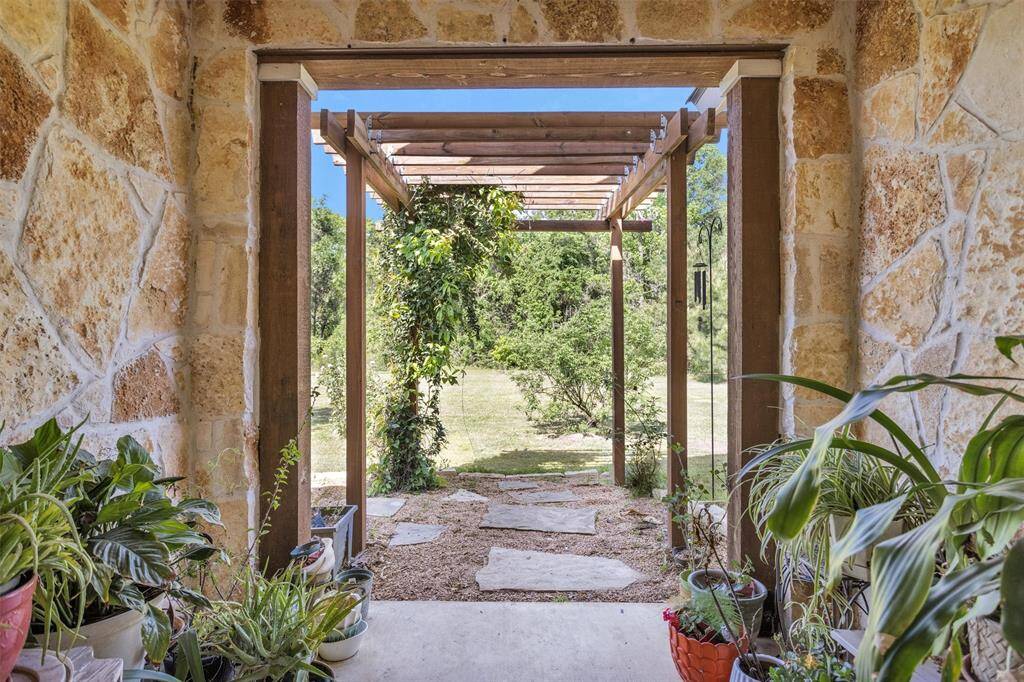 Cedar pergola welcome you into front entry.