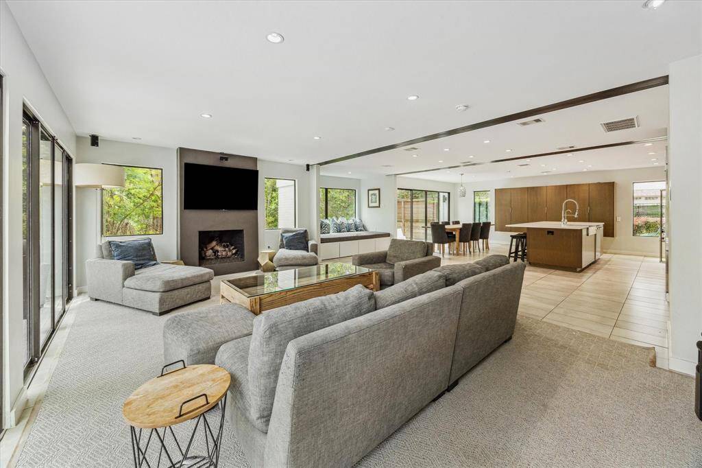 Enjoy cooking and being with family in the main, open-concept living space which is also perfect for entertaining with large sliding doors that open to the back yard.