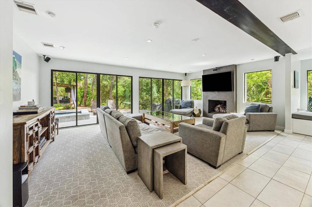 Enjoy cooking and being with family in the main, open-concept living space which is also perfect for entertaining with large sliding doors that open to the back yard.