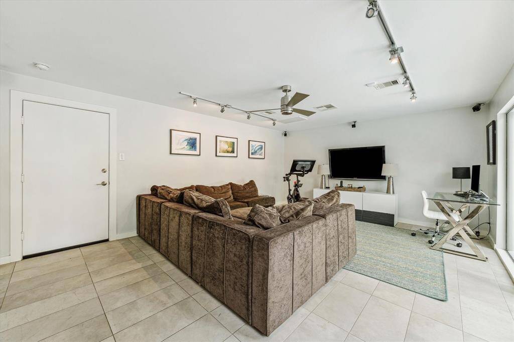 Large playroom on opposite side of house is a great retreat for kids of all ages.
