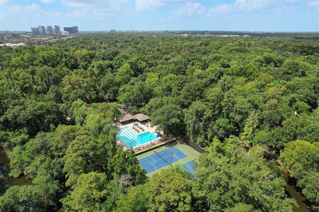 Neighborhood swimming pool and tennis/pickleball courts are a short walk from the house.