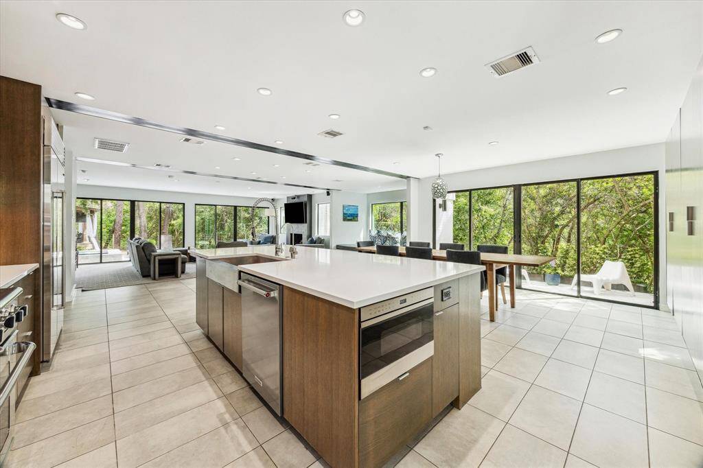 Enjoy cooking and being with family in the main, open-concept living space which is also perfect for entertaining with large sliding doors that open to the back yard.
