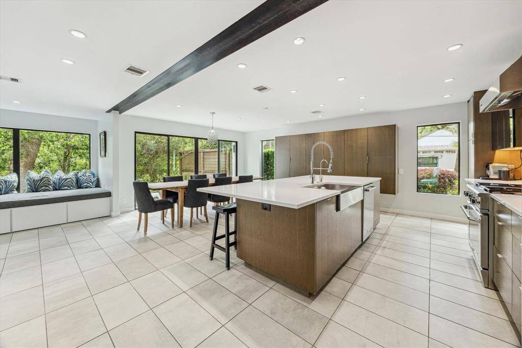 Enjoy cooking and being with family in the main, open-concept living space which is also perfect for entertaining with large sliding doors that open to the back yard.