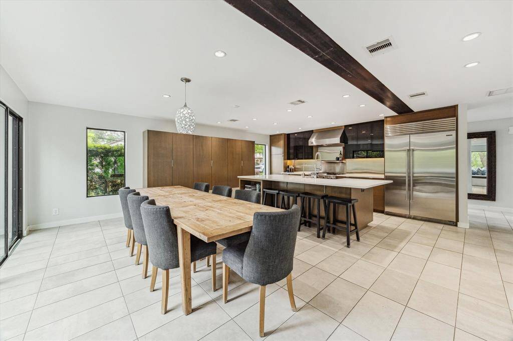 Enjoy cooking and being with family in the main, open-concept living space which is also perfect for entertaining with large sliding doors that open to the back yard.