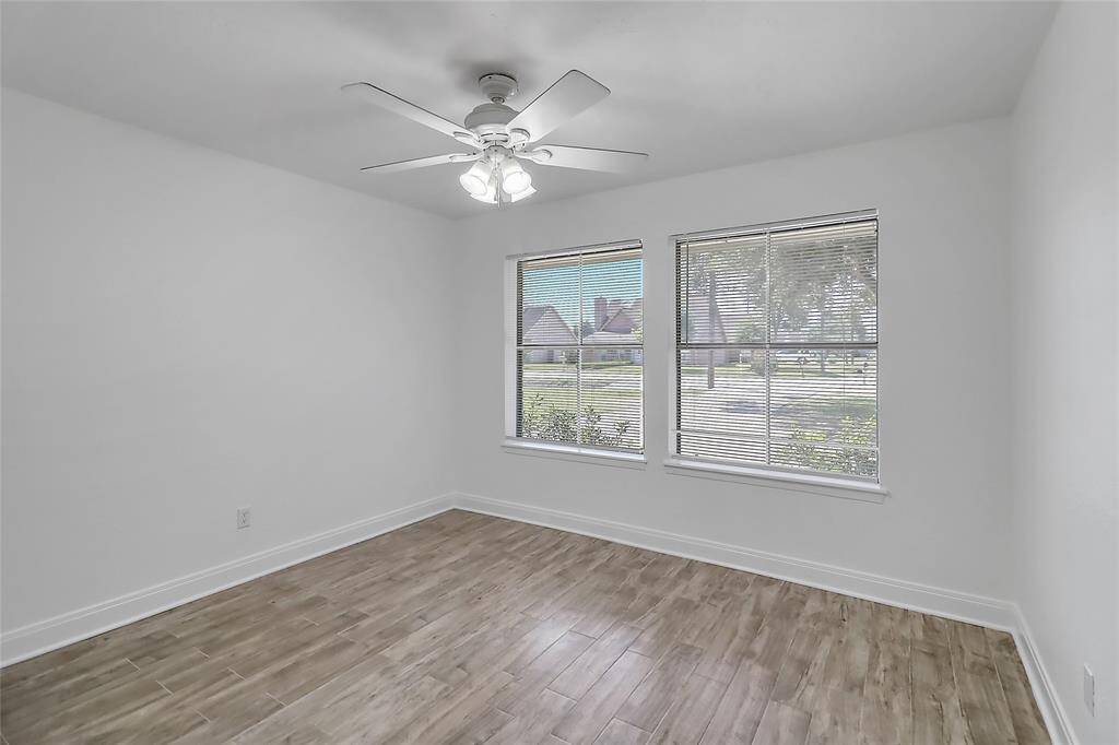 Each secondary bedroom is a cozy and versatile retreat, offering ample space and natural light.