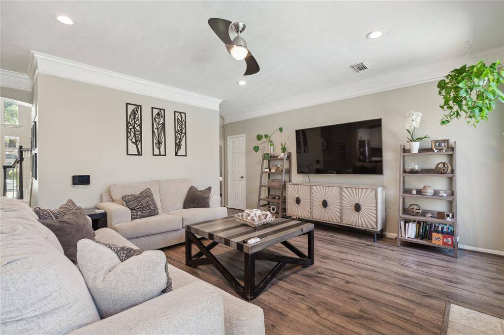 Whether you're hosting friends or enjoying a quiet evening at home, this living room feels like a warm embrace.