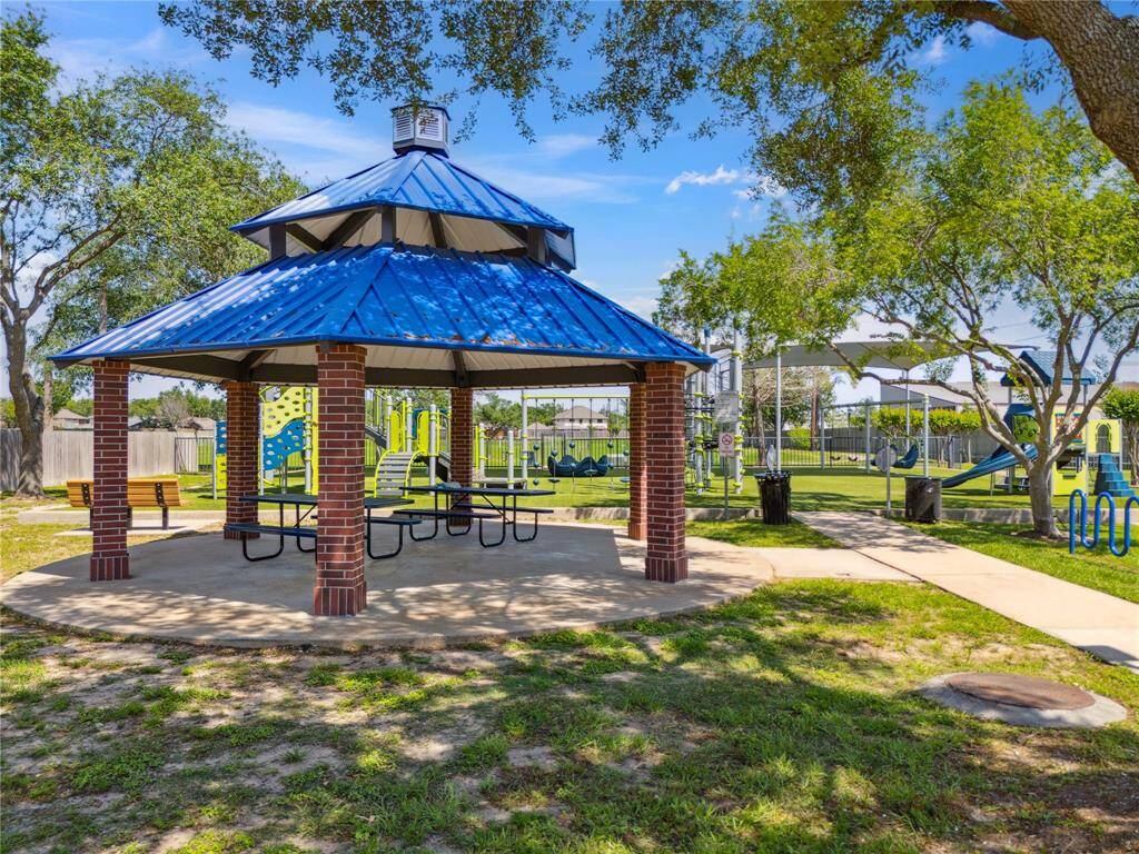 The community offers more than just a great home—this covered pavilion is the perfect gathering spot for birthdays, picnics, or relaxing in the shade while kids play.