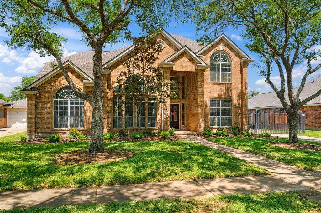 The manicured lawn and charming front walkway create incredible curb appeal, inviting you into a space that’s as warm as it is impressive.
