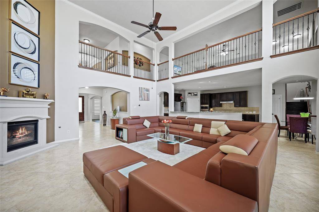 Experience the expansive elegance of the family room, perfect for family gatherings