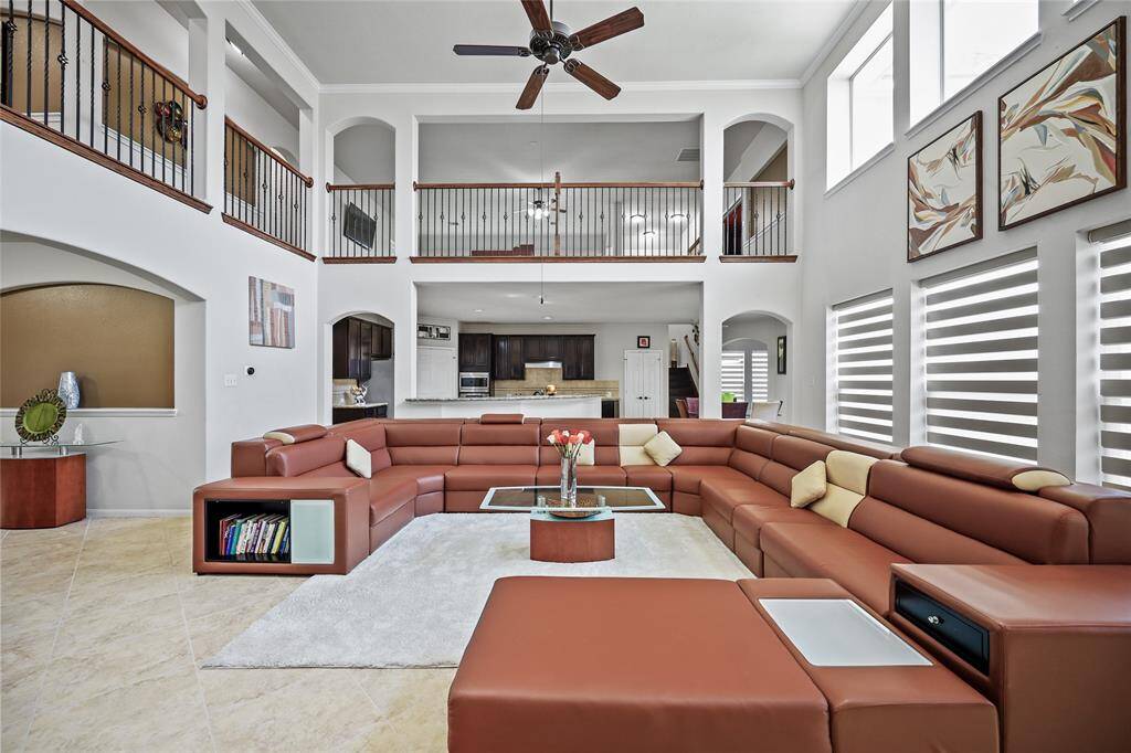 Enjoy the airy ambiance of the open floor plan overlooking the spacious living area.