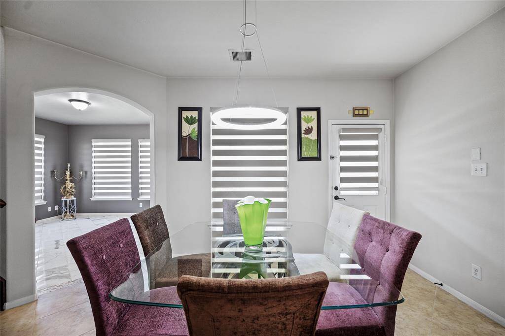 Cozy breakfast nook conveniently adjacent to the kitchen.