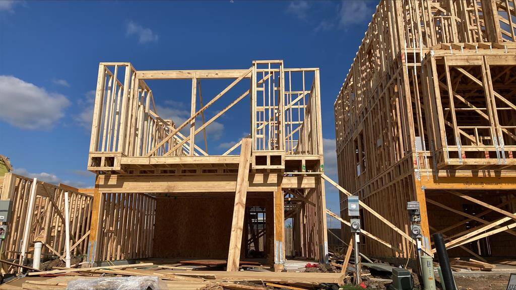 Three-story home with 3 bedrooms, 3.5 baths and 2 car garage
