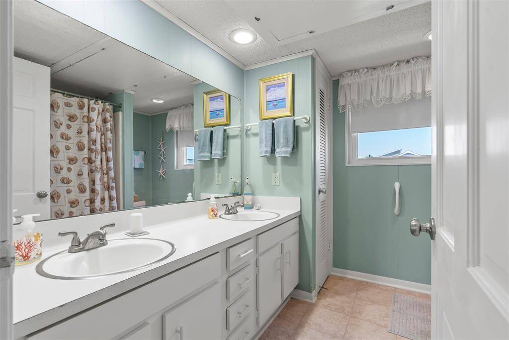 Double sinks, plenty of vanity space and storage
