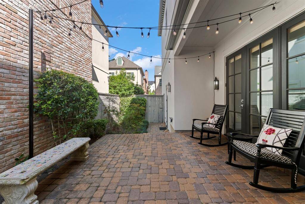 Just off the first-floor breakfast nook is a private, fenced-in patio.