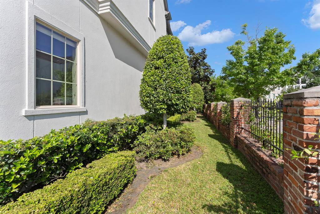 Prime corner placement delivers both a side yard and uninterrupted views of the Waterway trails from every level of the home.