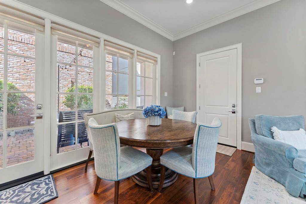 The breakfast nook offers access to the patio and garage, and is open to the family room and kitchen.