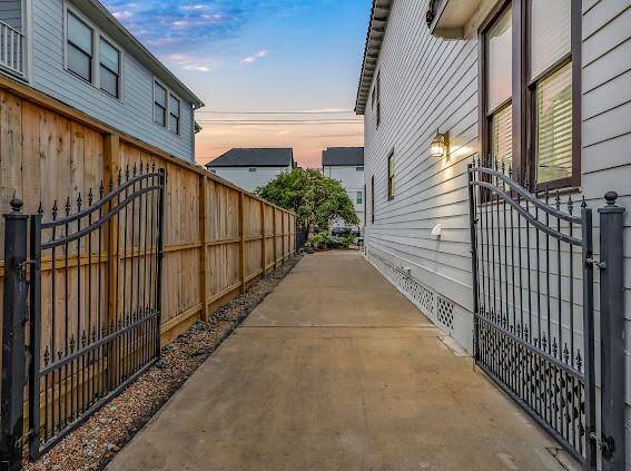 Long driveway for parking with privacy gate