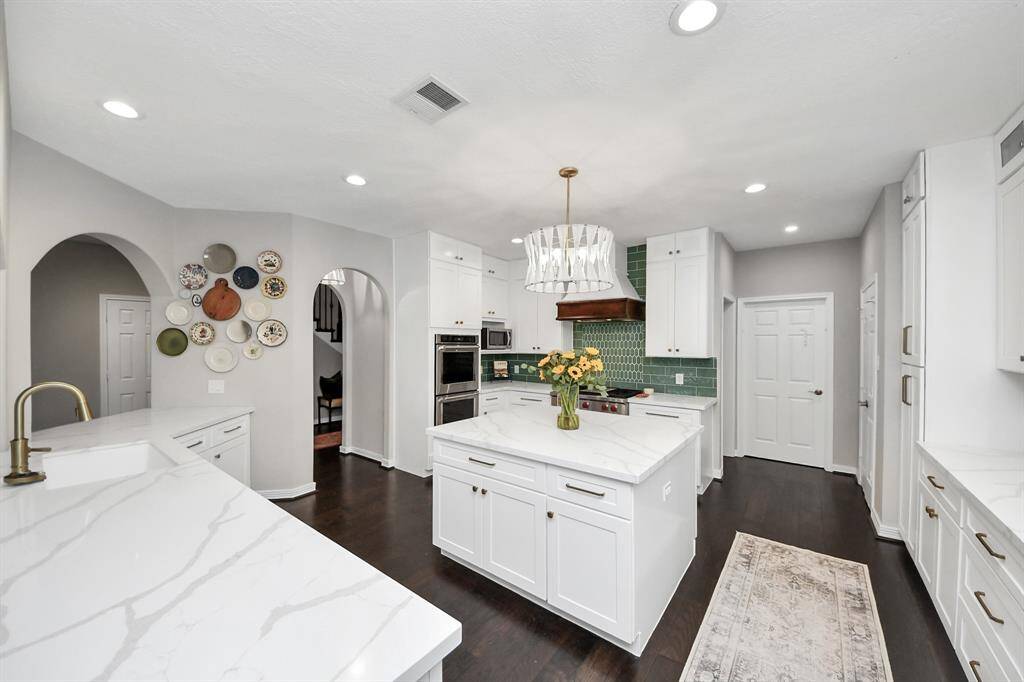 In the kitchen sink area, they added an undercounter sink, extendable faucet, a bottle washer, new dishwasher and garbage disposal button.