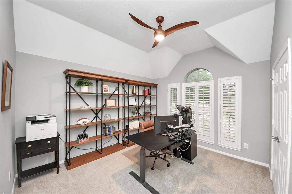 This bedroom that was turned into the home’s second office is the only bedroom without a walk-in closet,