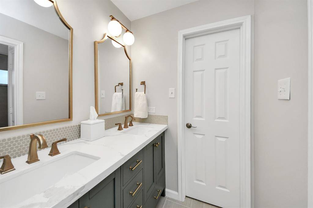The second and third upstairs bedrooms will both have access to the jack and jill bath in between them.