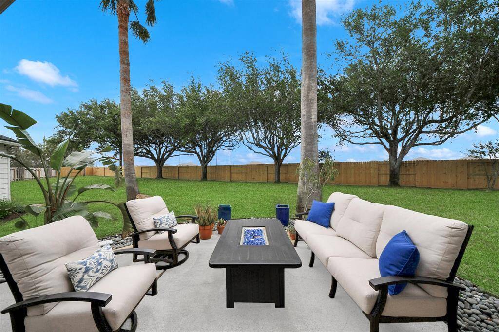 If the house itself didn’t do it for you, part of the expanded dream was the massive back yard with no back neighbors as the home backs up to two green spaces. The largest lot equals the blankest canvas for you to create your own backyard oasis. This was the only thing left on the homeowner’s dream home list to tackle, a large covered patio element.