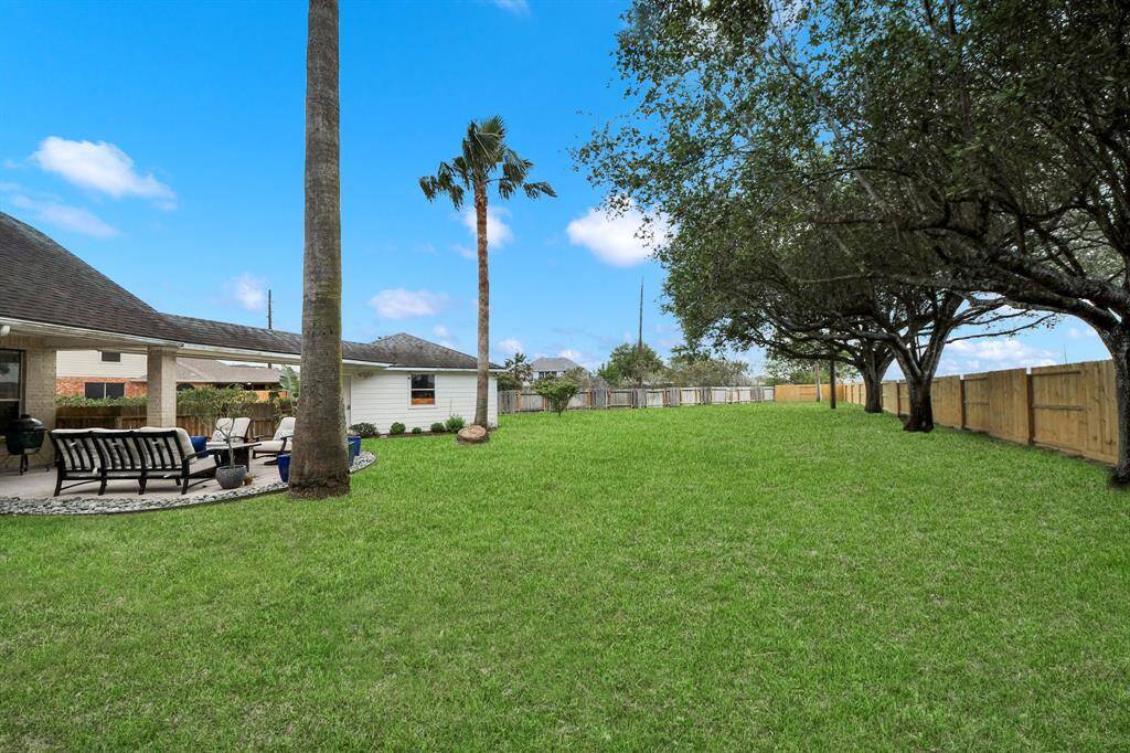 A 12 zone sprinkler system was installed to keep the yard healthy along with french drains in the hard to move water places.