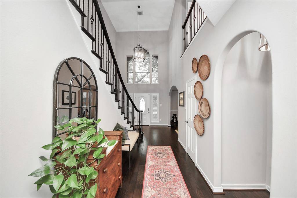 With quick look back at the front door down the main hallway, you’ll see a coat closet and head into the kitchen.