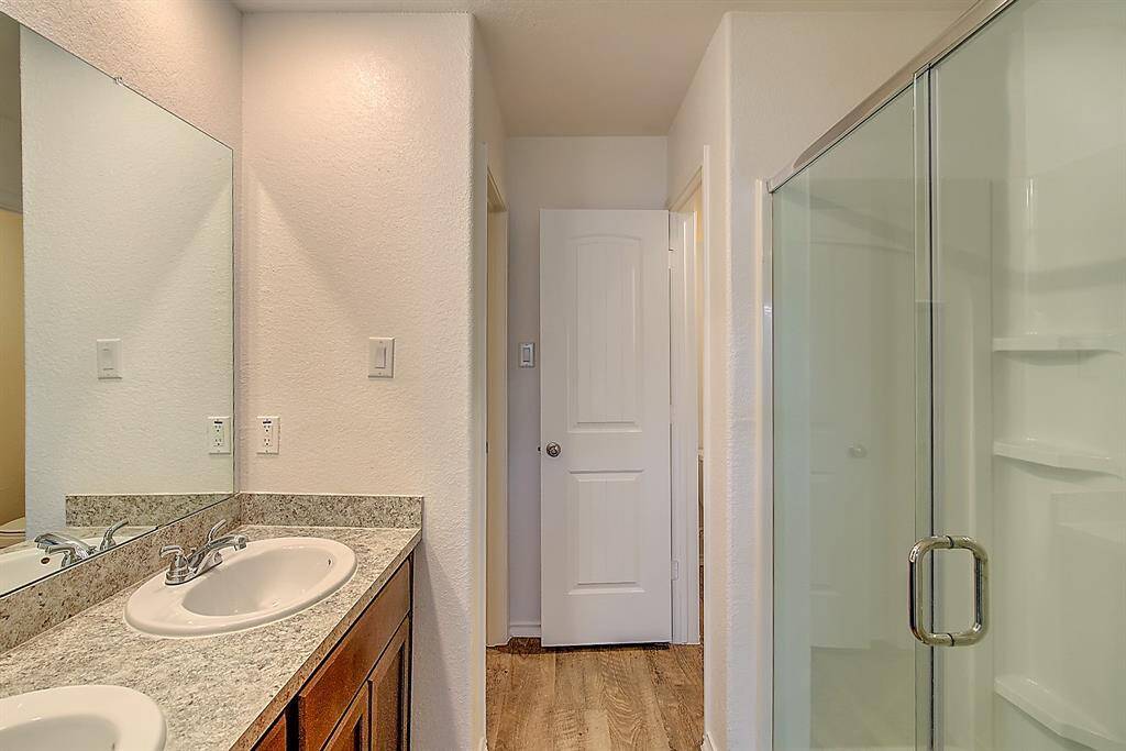 primary bathroom with standalone shower (and walk-in closet)
