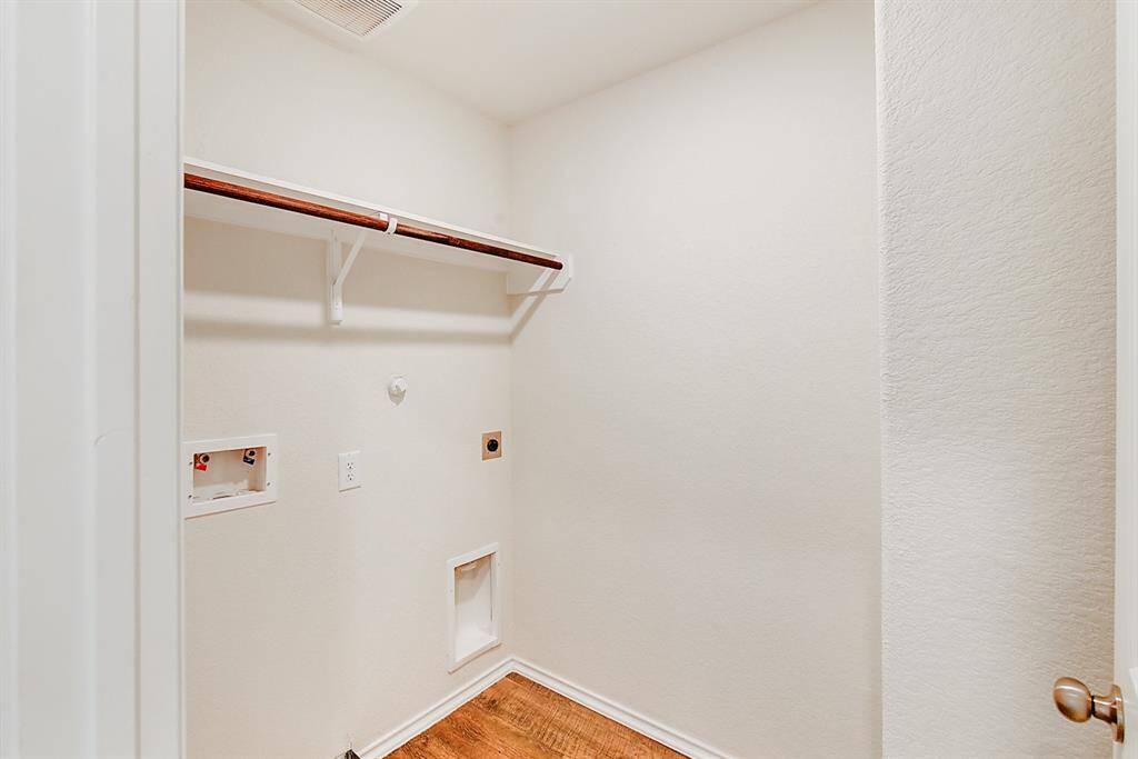 utility room with electric W/D connections
