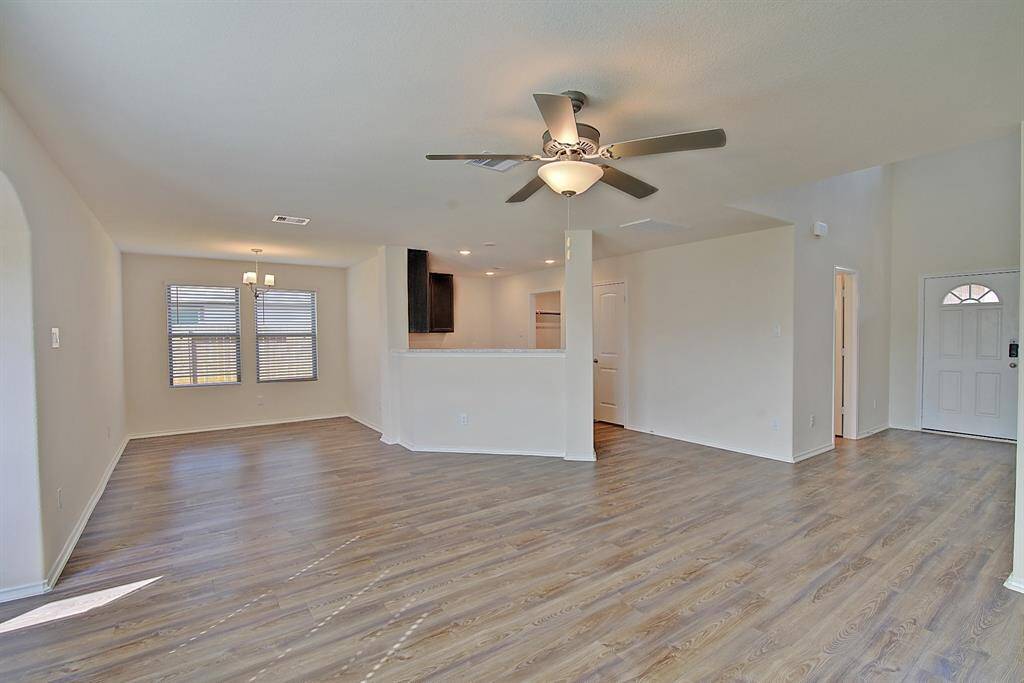 a view of the living room facing the dining room