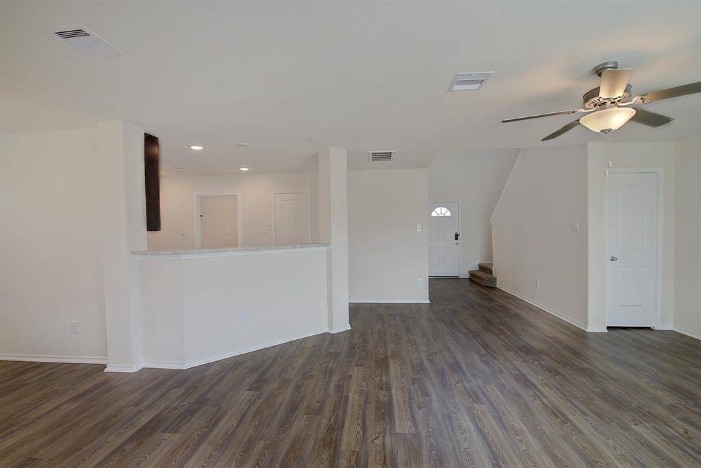 another view from the living room looking towards the front entrance