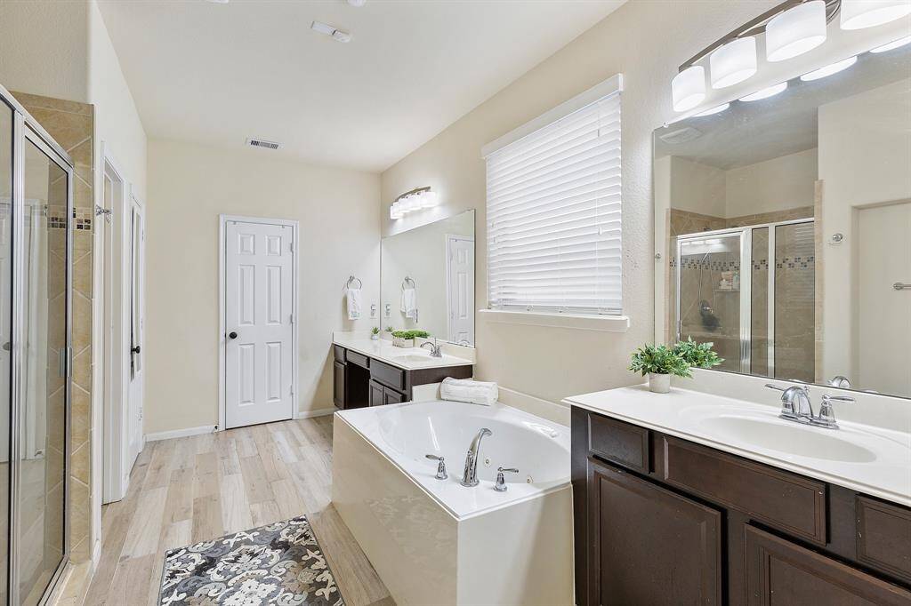 Double Sinks, Vanity and Jacuzzi Tub